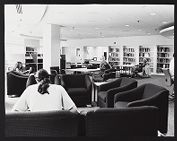 Students studying in the Joyner Library lobby